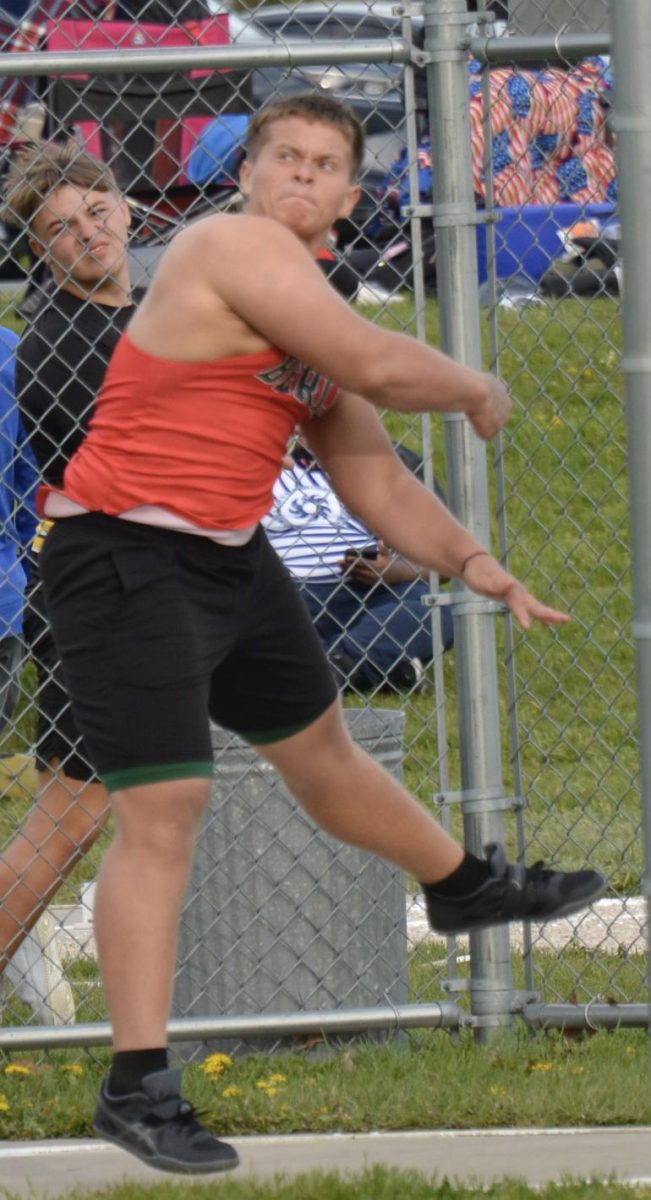 New student junior Nainoa Lima launches the discus through the air at the Campbellsport invite on May 12. Nainoa threw the discus 105’ 0” and placed eighth. “I would have thought that it would have been rough the first couple of weeks, but it's been really smooth,” Nainoa said.