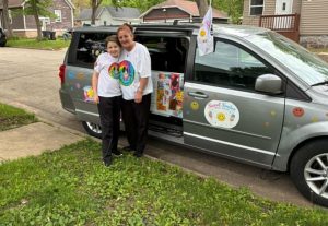 Ice cream truck owner Sue-Z Zenku (right) and son Dre Zenku (left) stand in front of their ice cream truck. Zenku started selling ice cream earlier this month.  “It was very difficult to launch this project with many setbacks, but I was determined to start this business and teach my son Dre about business and great customer service.” Zenku said